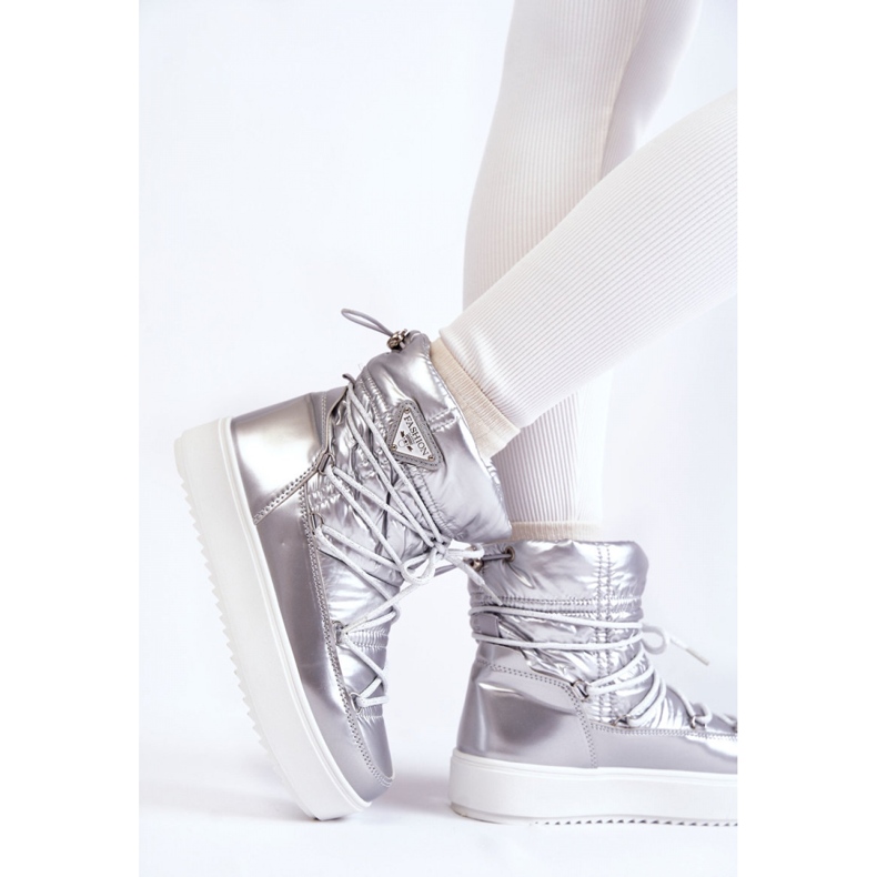 Boots de neige plateforme à lacets argentées Femme gris 1