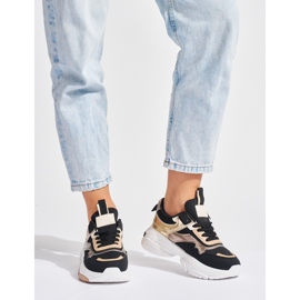 Baskets noires et dorées à semelle épaisse 1