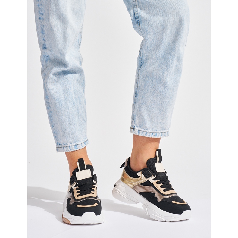 Baskets noires et dorées à semelle épaisse le noir 1