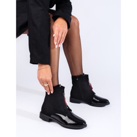 Bottines noires classiques à talons plats le noir 1