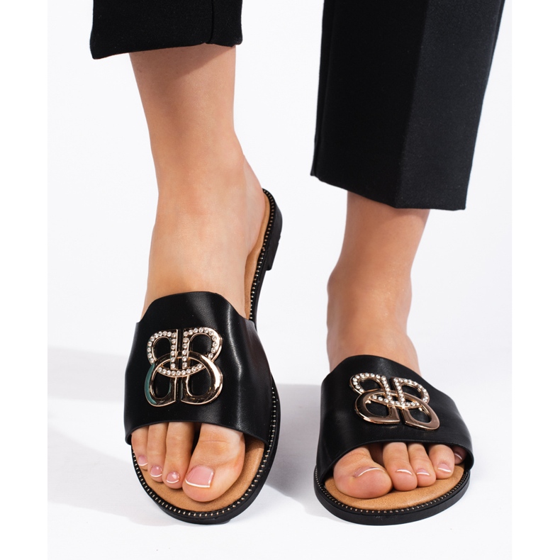 Claquettes plates femme noires 1
