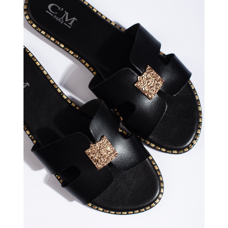 Claquettes plates noires pour femme 1