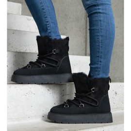 Boots de neige femme noires à plateforme et doublure en fourrure 1