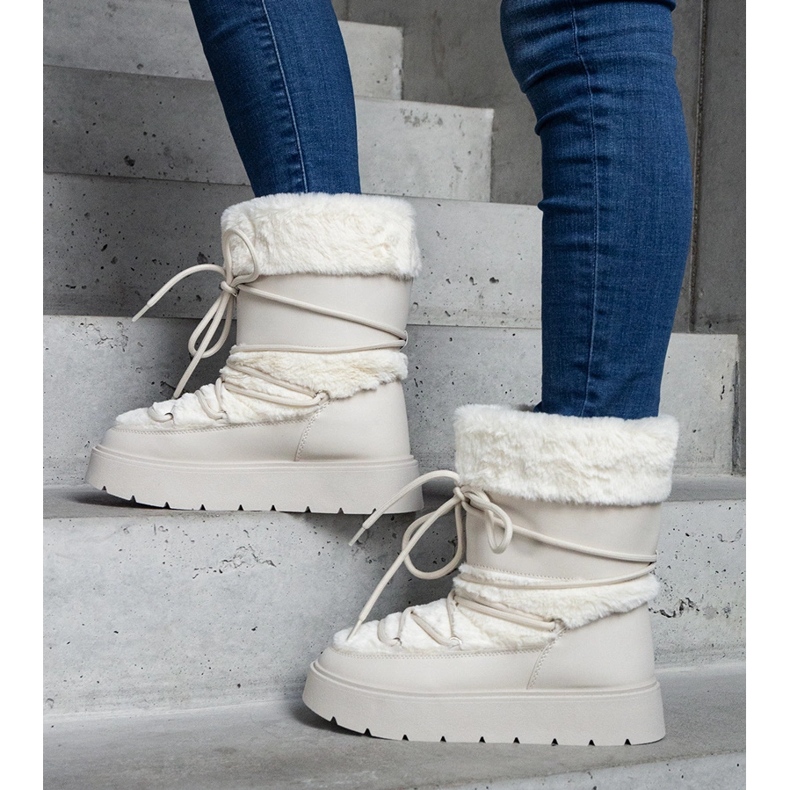 Bottes de neige à enfiler pour femme isolées beige clair ornées de fourrure 1