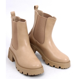 Bottines Chelsea à tige haute et fourrure beige kaki 1