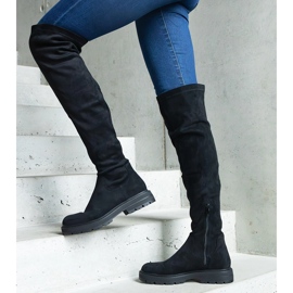 Bottes longues noires à tige souple et semelle plate 1