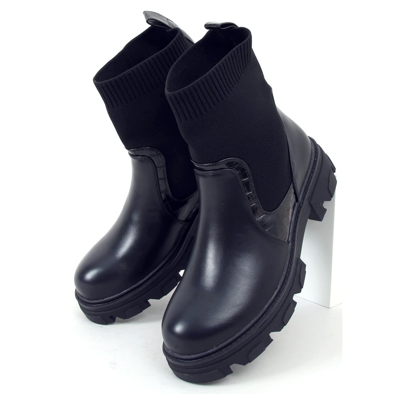 Bottines noires à tige chaussette 1
