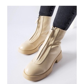 Bottines isolées beiges avec fermeture éclair 1