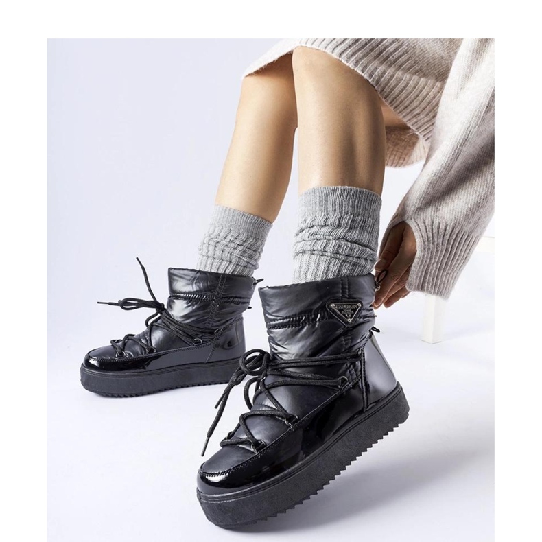 Bottes de neige isolées noires avec bande élastique le noir 1 Bottes de neige isolées noires avec bande élastique le noir 1