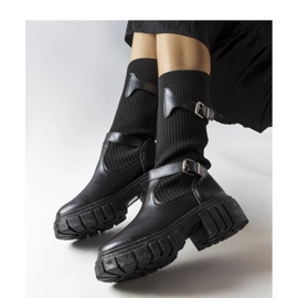 Bottes élégantes noires avec une tige élastique le noir 1 Bottes élégantes noires avec une tige élastique le noir 1