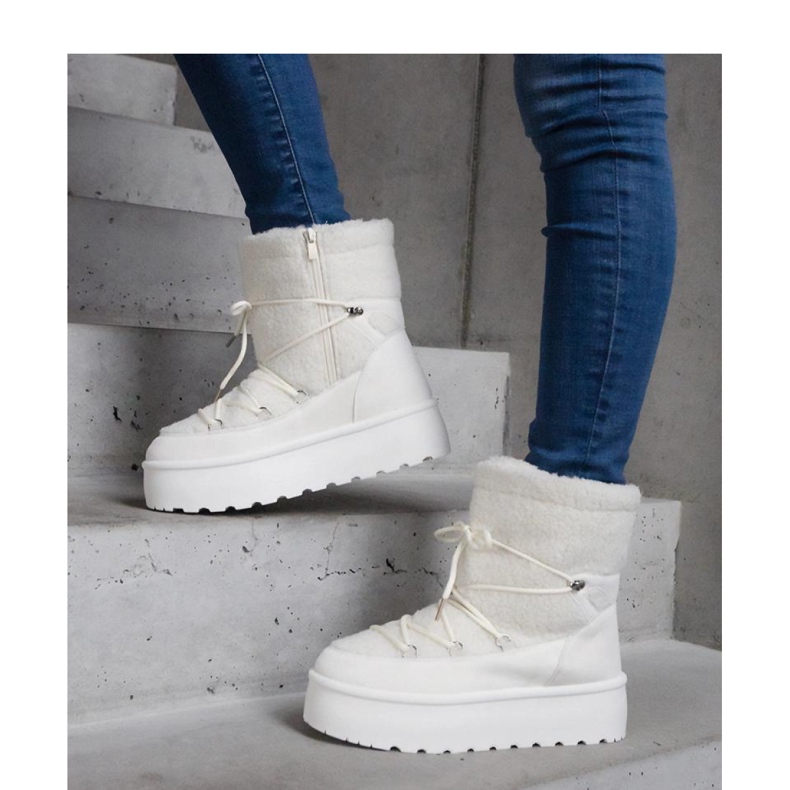 Bottines de neige à plateforme blanches avec fourrure 1