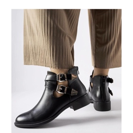 Bottines noires découpées à boucles 1