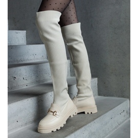 Bottines beige clair à tige souple et talon plat 1 Bottines beige clair à tige souple et talon plat 1