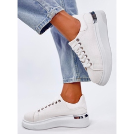 Sneakers toile sportive féminine sur les quartiers blancs 1