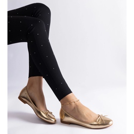 Ballerines dorées ornées d'un nœud d'or 3