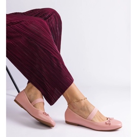 Ballerines roses avec une bande élastique et un arc décoratif 2