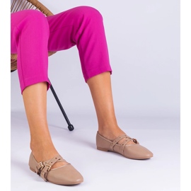 Ballerines beiges en écot-peu décorées de boucles 1