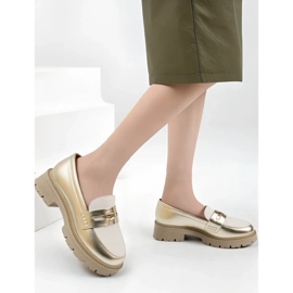 Mocassins en or féminin doré 2