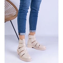 Bottes beiges en écara avec des découpes à thèses plates 1