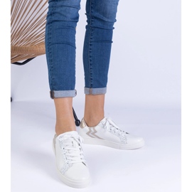 Baskets blanches pour femmes avec un gaufrage et des paillettes 1