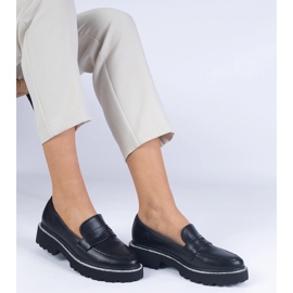Mocassins des femmes noires sur une semelle épaisse le noir 1