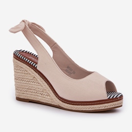Sandales compensées beiges avec tresses 4