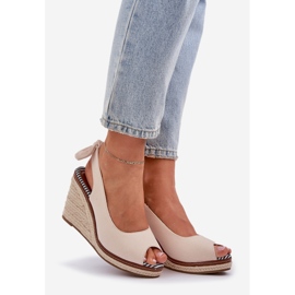 Sandales compensées beiges avec tresses 1