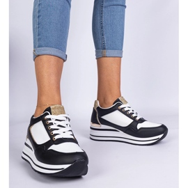 Baskets noires décorées de paillettes et d'un insert en métal le noir 1