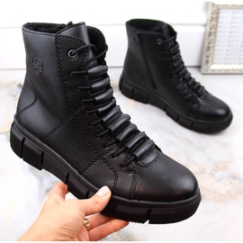 Bottes compensées noires isolées confortables pour femmes Rieker X3428-00 le noir 1