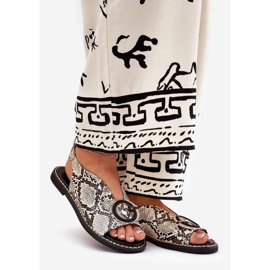 Sandales plates avec une décoration de serpent à motif en brun beige 1