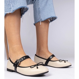 Ballerines féminines beige avec un arc 1