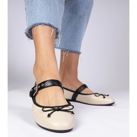 Ballerines féminines beige avec un arc 3