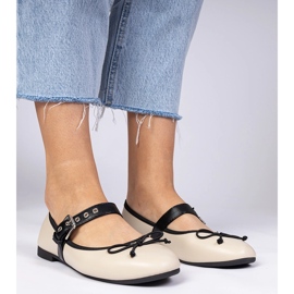 Ballerines féminines beige avec un arc 4