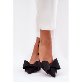 Talons hauts avec des talons nus et un arc noir le noir 3