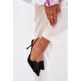 Talons hauts avec des talons nus et un arc noir le noir 5