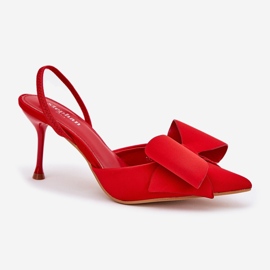 Talons hauts avec des talons nus et un arc rouge 4