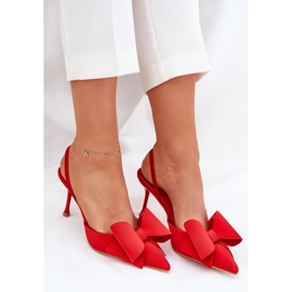 Talons hauts avec des talons nus et un arc rouge 7