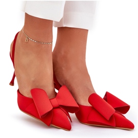 Talons hauts avec des talons nus et un arc rouge 8