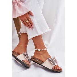 Slippers pour femmes avec un arc sur une plate-forme en liège beige 6