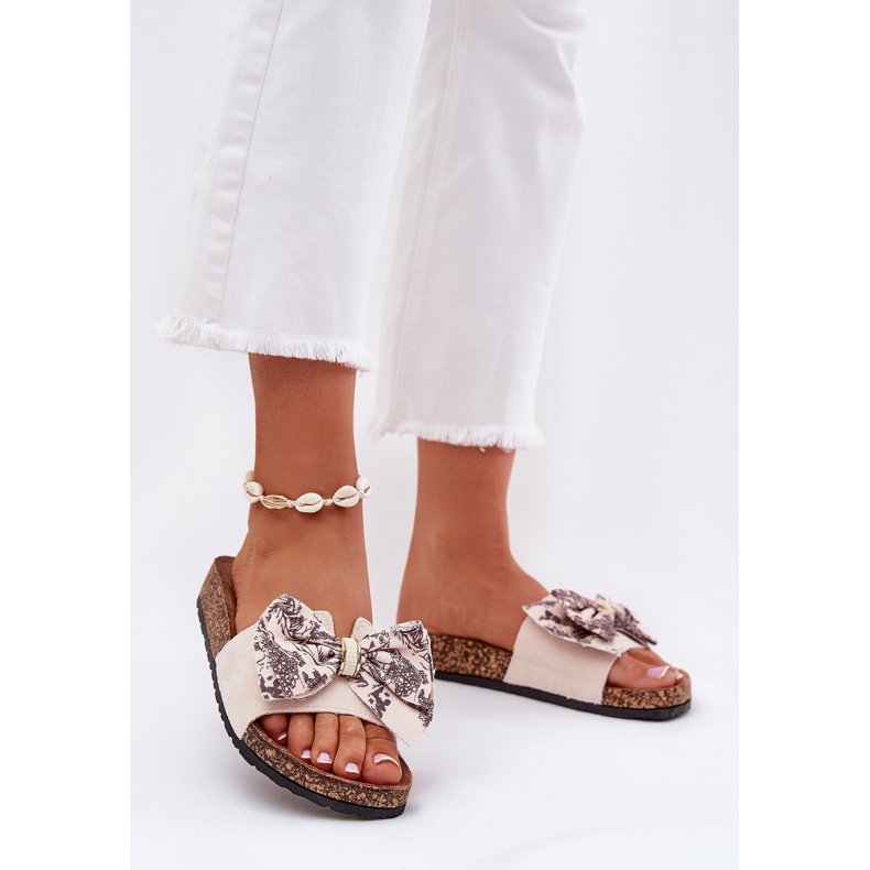 Slippers pour femmes avec un arc sur une plate-forme en liège beige 2