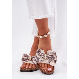 Slippers pour femmes avec un arc sur une plate-forme en liège beige 3