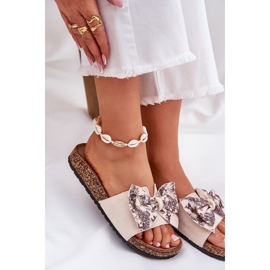 Slippers pour femmes avec un arc sur une plate-forme en liège beige 7