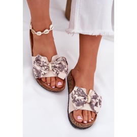 Slippers pour femmes avec un arc sur une plate-forme en liège beige 8