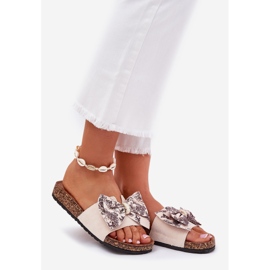 Slippers pour femmes avec un arc sur une plate-forme en liège beige 1
