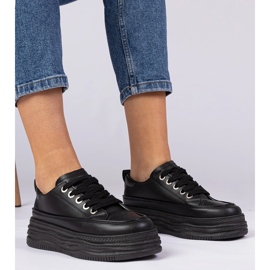 Baskets pour femmes noires sur une semelle haute le noir 1