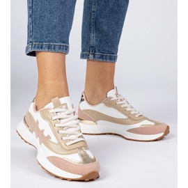 Baskets féminines blanches et roses avec un accessoire léopard 3