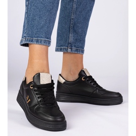 Baskets noires avec des paillettes dorées 1