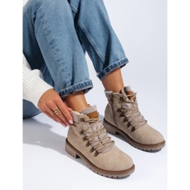 Bottes beiges pour dames avec manteau en peau de mouton 1