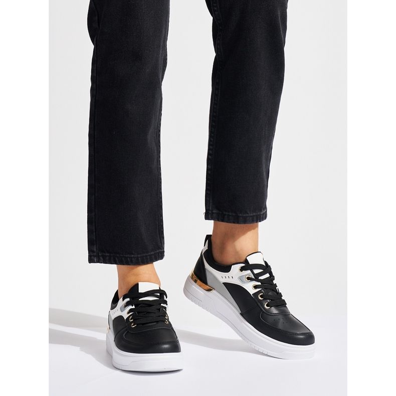 Chaussures de sport à plateforme noires le noir 1