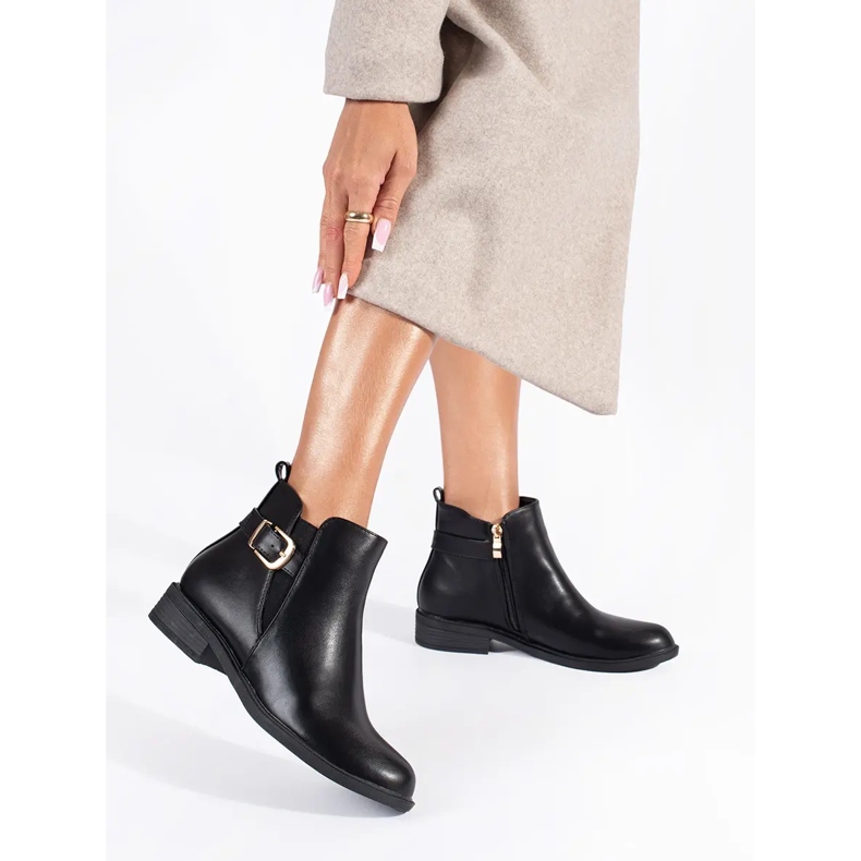 Bottines Chelsea femme noires avec éléments dorés 1